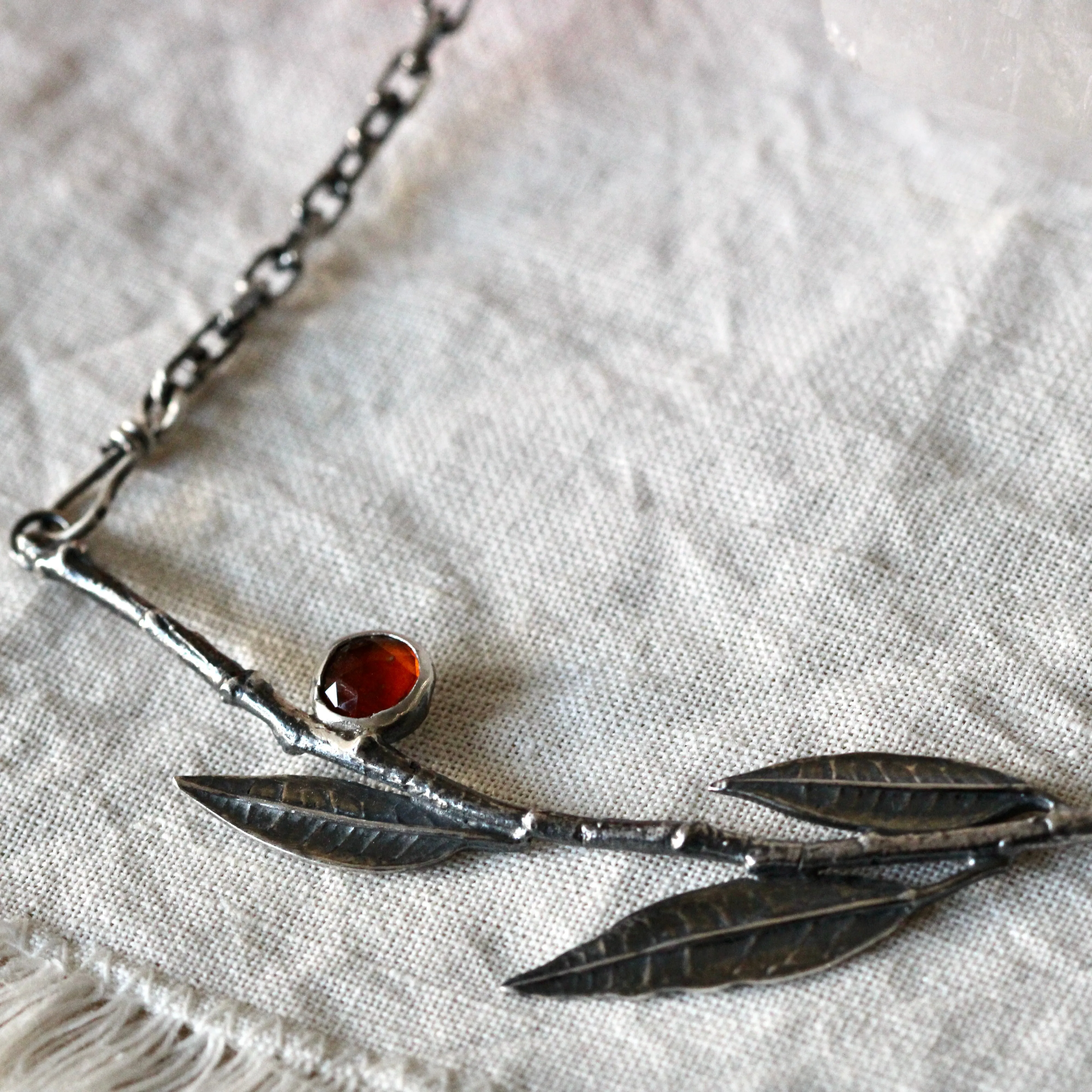 Interchangeable Sterling silver branch with orange leaves and Kyanite pendant